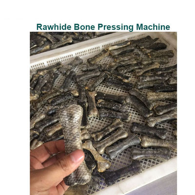 Косточка собаки создателя корма для домашних животных делая машина яловку выследить обработку жеваний