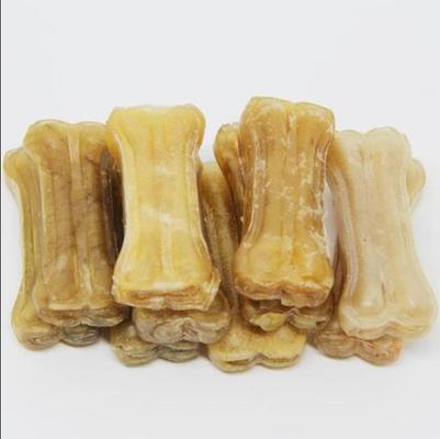 Естественные закуски косточки собаки отжимая машины косточки яловки овчины делая машину для заботы собаки зубоврачебной